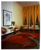 lobby, red rug, yellow and red curtains