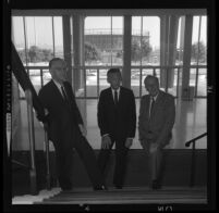 Henry Dreyfuss, left, Lew Wasserman and Walt Disney on grand staircase of Music Center Pavillion, Los Angeles, 1965