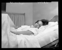Caren Marsh, in hospital, recovers from plane crash, 1949.