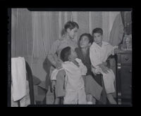 Yay Panlilio, Filipina-American and Phillipine guerilla leader, with her children, Los Angeles, 1945