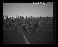 Tire Steal event at UCLA frosh-soph brawl, 1950.