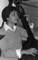 Frank de la Rosa playing double bass in 1979 [descriptive]