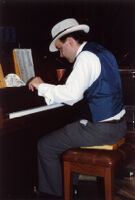 George Foley playing the piano in the Standard Oil Building atrium in Cleveland, Ohio, in 1987 [descriptive]