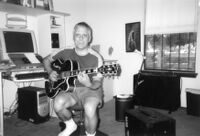 Tony Cesarano playing guitar, Albuquerque 2004 [descriptive]