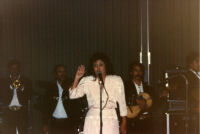 Raquel singing with mariachi