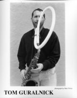 Publicity shot of Tom Guralnick on saxophone, 1997 [descriptive]