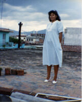 Woman standing on roof