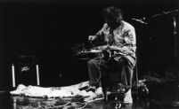 Eugene Chadbourne playing the guitar in New York City, 1988 [descriptive]