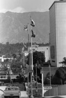 Flagpole near Civic Center mall during a period of high winds, Los Angeles, 1969