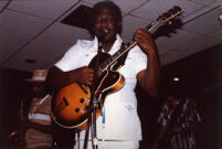 Fenton Robinson playing guitar in Cleveland, 1987 [descriptive]