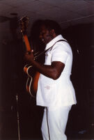 Fenton Robinson playing guitar in Cleveland, 1987 [descriptive]