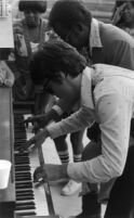 Curtis Salgado with Dr. Wild Willie Moore playing the piano, San Francisco, 1977 [descriptive]