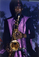 John Gilmore playing saxophone with the Sun Ra Arkestra in Oakland, California, 1985 [descriptive]