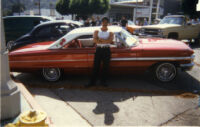 Steve posing in front of Low Rider car