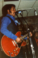 Jimmy Johnson playing guitar, 1987 [descriptive]