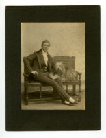 Robertson, W. G. on bench with dog, portrait by R & H Stiles.