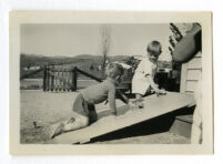 Boys playing on a ramp, 1930-1931.