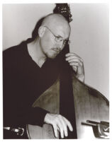 Scott Colley playing the double bass in Los Angeles [descriptive]