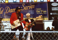 Bo Diddley and an unidentified guitarist performing at the Santa Monica Pier Twilight Dance Series, July 9, 1998 [descriptive]