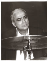 Chuck Flores playing the drums in Los Angeles [descriptive]
