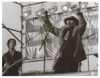 Bo Diddley and an unidentified guitarist performing at the Santa Monica Pier Twilight Dance Series, July 9, 1998 [descriptive]
