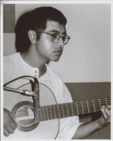 Fareed Haque playing guitar, Los Angeles [descriptive]