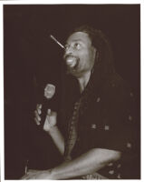 Bobby McFerrin holding a microphone, Los Angeles [descriptive]