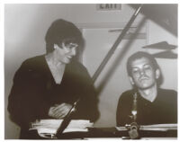 Ruth Price at a piano with Brad Mehldau, Los Angeles [descriptive]