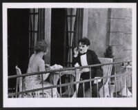 Edna Purviance and Charlie Chaplin in The Adventurer