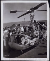 Andrea King and crew members preparing to film a scene from the air in I Was a Shoplifter