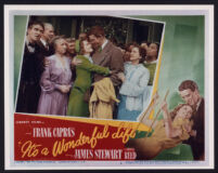 James Stewart, Donna Reed, and others in It's a Wonderful Life