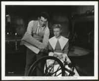 Ginger Rogers and unidentified cast member in The Magnificent Doll