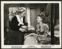 Ginger Rogers and unidentified cast member in The Magnificent Doll