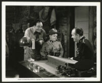 Addison Richards and unidentified actors in The Man from Montreal