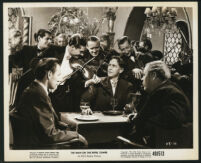 Franchot Tone, Charles Laughton and unidentified cast member and extras in The Man On The Eiffel Tower