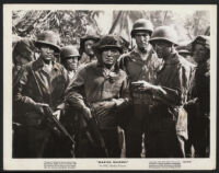 Pat O'Brien, Robert Ryan and unidentified cast members in Marine Raiders