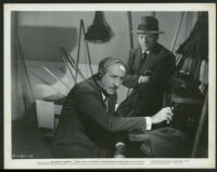 Adolphe Menjou and Michael O'Shea in Mr. District Attorney