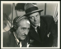 Adolphe Menjou and Michael O'Shea in Mr. District Attorney