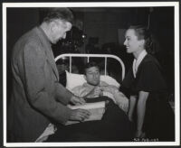 Director Tay Garnett with Robert Mitchum and Ann Blyth on the set of One Minute To Zero