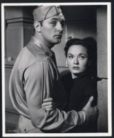 Robert Mitchum and Ann Blyth in One Minute To Zero