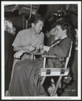 Jane Russell speaking to an assistant director while shooting The Paleface