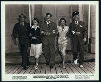 Joel McCrea, Mary Astor, director Preston Sturges, Claudette Colbert, and Rudy Vallee in The Palm Beach Story