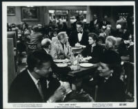 Katherine Hepburn, Spencer Tracy, other cast members, and extras in Pat and Mike