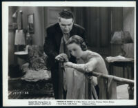 J. Carrol Naish and Patricia Morison in Persons In Hiding