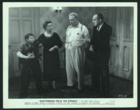 Guy Kibbee, Emma Dunn, Bobs Watson and an unidentified actor in a scene from Scattergood Pulls The Strings