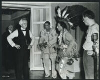 Iron Eyes Cody and Chief Thundercloud coaching William Powell between scenes on The Senator Was Indiscreet