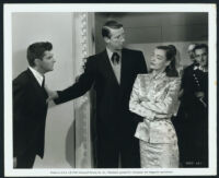 Peter Lind Hayes, George Mann, Ella Raines and extras in a scene from The Senator Was Indiscreet
