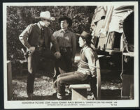 Johnny Mack Brown, John Merton and an unidentified actor in a scene from Shadows on the Range
