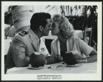 Victor Mature and Karen Steele in a scene from The Sharkfighters