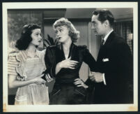 Joan Bennett, Franchot Tone and Eve Arden in a scene from She Knew All The Answers
